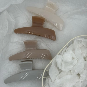 Set of 4 minimalist acrylic hair claw clips in matte beige, coffee, and purple tones