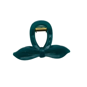 Pince à cheveux nœud vert canard élégante avec ressort doré sur fond blanc pur