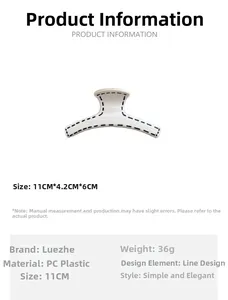 Detailed view of white hair claw clip size 11cm by 4.2cm made of durable PC plastic