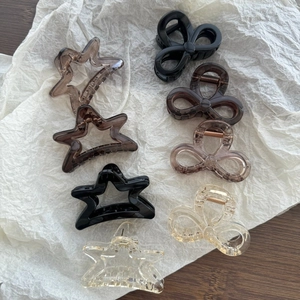 Minimalist transparent star and bow hair claw clips set in various classic colors
