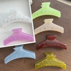 Set of 7 colorful hair claws with sparkling rhinestones for elegant styling