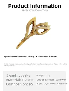 Detail view of tulip hair claw clip in beige marble finish measuring 13cm in length
