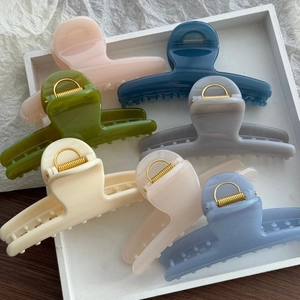 7-piece colorful hair claw clip set with matte finish and durable gold metal spring