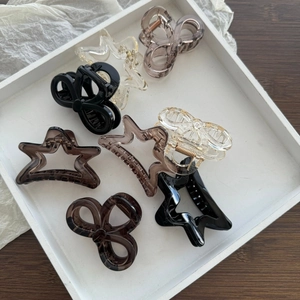 Minimalist clear star claw clips and butterfly hair clamps for women in assorted colors