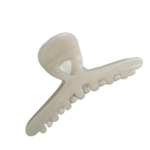 Elegant ivory gloss hair claw clip with cross design for French style updo hairstyles