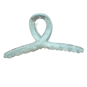 Grande molletta per capelli in marmo blu e bianco con elegante design a torsione