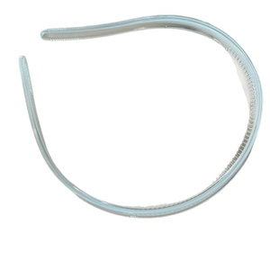 Light blue transparent resin headband with non-slip teeth on a white background