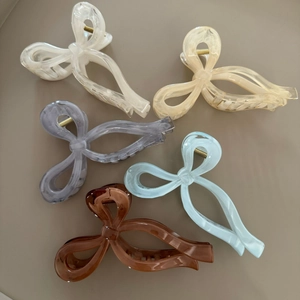 Elegant large bow hair clips in five assorted colors including champagne and blue