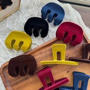 Elegant M-shaped flocked velvet hair claw clips for women in various autumn colors