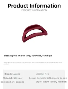 Détail d'une grande pince à cheveux en silicone rouge foncé de 10,5cm avec dimensions