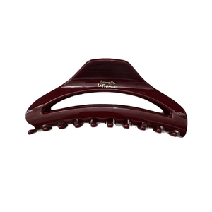 Elegant large burgundy crescent hair claw clip with glossy finish and brand logo