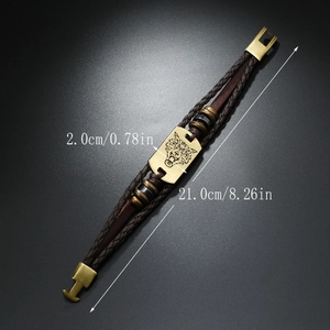 Detail of brown braided leather bracelet with vintage gold wolf head plaque and dimensions