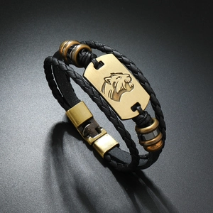 Detailed macro shot of men's leather bracelet with vintage tiger head metal charm