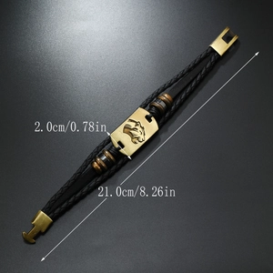 Detail view of punk style leather bracelet with leopard head and size dimensions 21x2cm