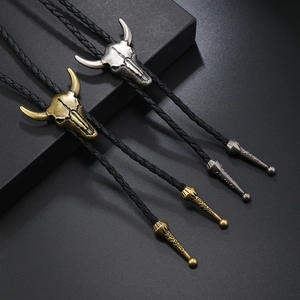Vintage-Bolo-Tie-Set mit Bullenschädel in Antik-Gold und Silber mit schwarzer Lederkordel