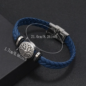 Detailed size view of blue braided leather bracelet with stainless steel tree of life charm