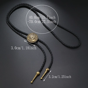Detailed view of adjustable bolo tie featuring floral relief slider and metal tips