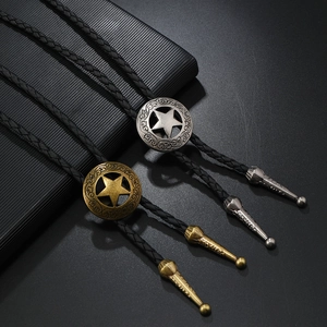 Set di cravatte Bolo vintage con ciondoli a stella in argento e bronzo su pelle intrecciata