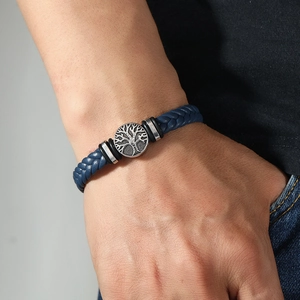 Men's blue braided leather bracelet featuring a silver Tree of Life metal pendant charm