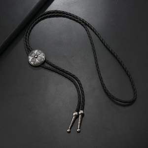 Vintage western bolo tie with engraved silver cross pendant and black braided PU cord