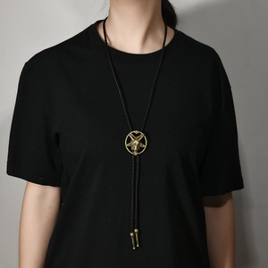 Vintage gothic bolo tie with goat head pentagram pendant on black braided cord