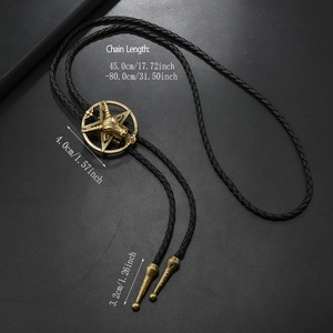 Detailed view of vintage sheep head bolo tie with adjustable leather cord measurements