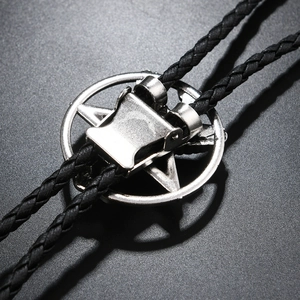 Macro shot of silver pentagram bolo tie back showing the adjustable metal slide clasp