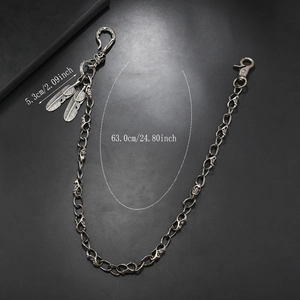 Macro detail of gothic skull link chain and feather pendants with size measurements