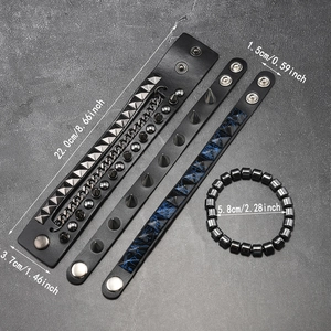 Detail of multilayer punk leather bracelets with metal studs, chains, and blue stone beads