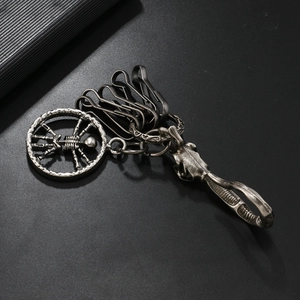 Gothic skull pendant metal keychain in vintage silver finish with multiple hooks