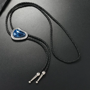 Vintage western bolo tie with blue marble stone and black braided leather necklace cord