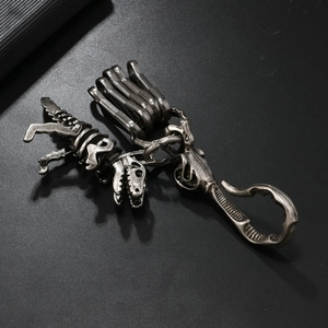 Detailed macro view of vintage silver dinosaur skeleton keychain made of durable alloy