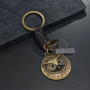 Vintage-Eulen-Schlüsselanhänger mit Bronze-Anhängern und gewebtem Lederband