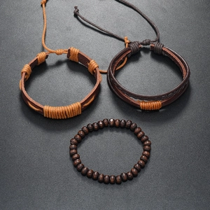 Close-up of a 3-piece set featuring wooden beads and multilayer braided leather bracelets