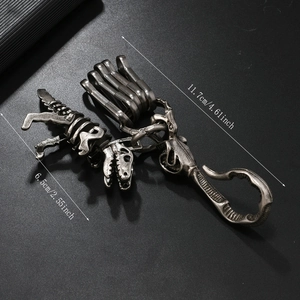 Creative dinosaur skeleton metal keychain with vintage silver finish and functional hooks