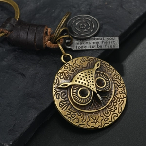 Vintage Eulen-Schlüsselanhänger mit Bronze-Eule und geflochtenem braunem Lederband