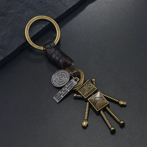 Porte-clés robot en bronze rétro avec lanière en cuir tressé et pendentif coeur