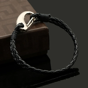 Bracciale retrò in pelle intrecciata da uomo con chiusura argento su portagioie