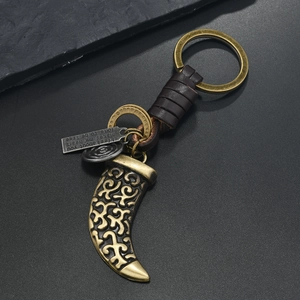 Vintage bronze alloy keychain with leather weave and engraved heart quote pendant