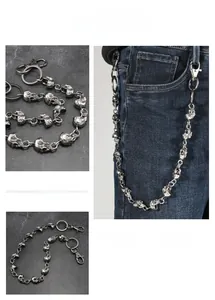 Detailed macro view of vintage punk skull belt chain with silver finish and lobster clasps