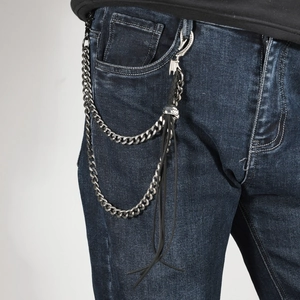 Chaîne de pantalon double couche argentée avec crâne et longues franges en cuir noir