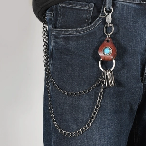 Double-layered hip hop waist chain with brown leather and turquoise on denim jeans