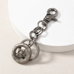 Retro silver alloy keychain with vintage wheel hub pendant and Roman numerals scale