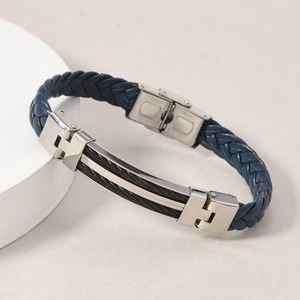 Detail view of navy braided leather bracelet with stainless steel cable inlay and clasp