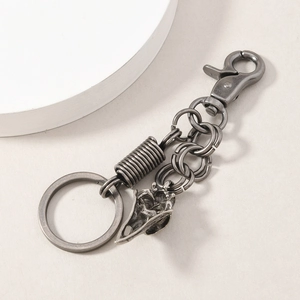 Vintage alloy skull crow head keychain with lobster clasp and metallic silver finish