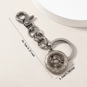 Vintage antique silver alloy wheel keychain with industrial design and lobster clasp