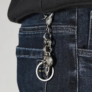 Vintage gothic skull metal keychain pendant in distressed alloy for streetwear