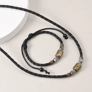 Vintage Tibetan style woven necklace and bracelet set with bronze swastika metal charms