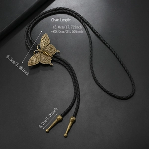 Detailed size view of bronze butterfly bolo tie with dimensions on braided leather cord