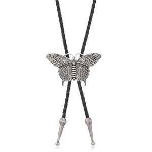 Vintage bolo tie with silver butterfly pendant and black PU cord on white background